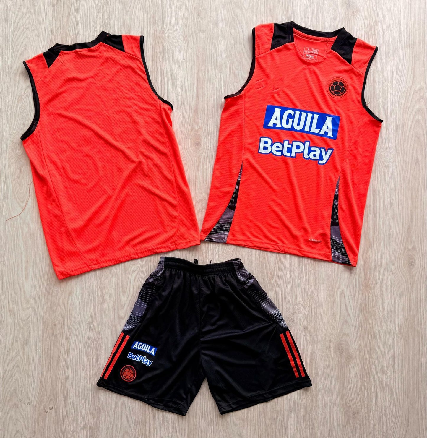 MUSCULOSA DE ENTRENAMIENTO DE COLOMBIA NARANJA